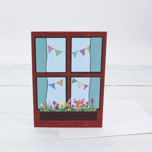 Window with bunting and flowers greetings card
